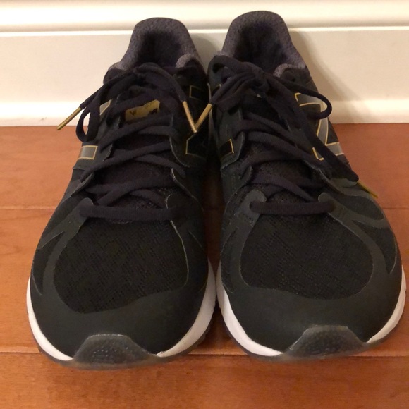 new balance 409 mens gold